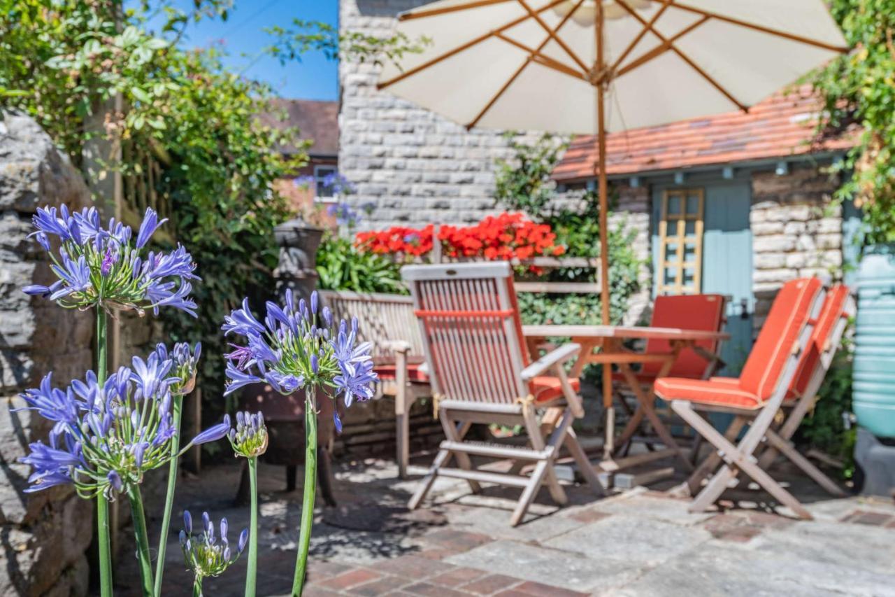 Passiflora Cottage สวาเนจ ภายนอก รูปภาพ